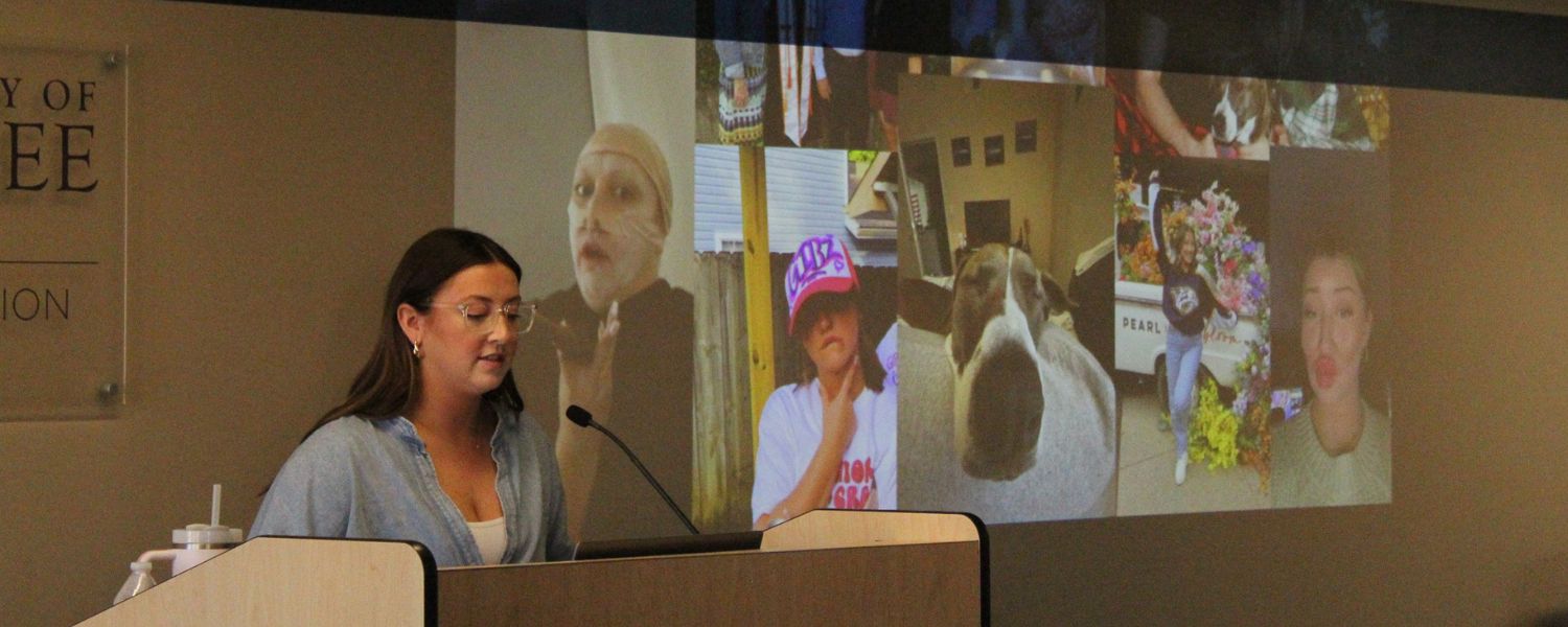 Gabby DePietro stands at the podium