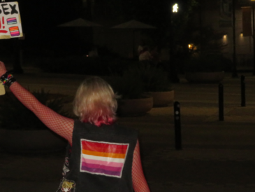 Woman holding a sign